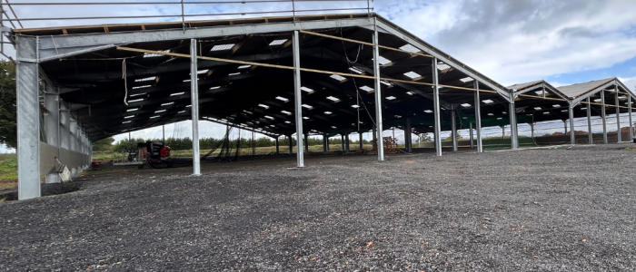 outside view of a large span agricultural building with scaffolding-style edge protection